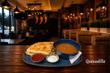 Giant flour tortilla stuffed with generous layer of melted cheese. Tender seasoned chicken, peppers and onions. Served with fresh salsa, spur cream and some excellent slow cooked charro beans.