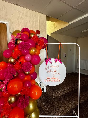 Welcome frame with balloons and florals and personalised welcome sign