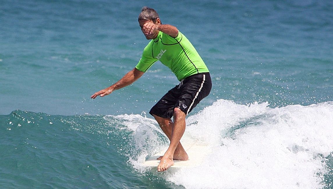 Mark Angell Master shaper surfing at Hanalei Bay