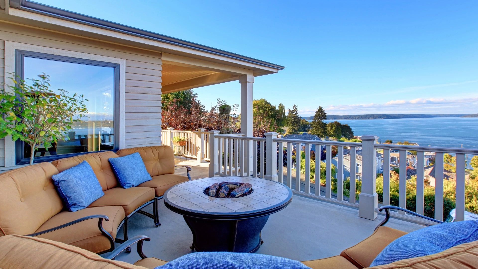 Home with a nice deck with view of bay.