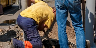 PLumbers digging