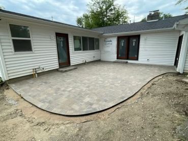Paver Patio installed by Frain Landscaping in Huntertown, Indiana.