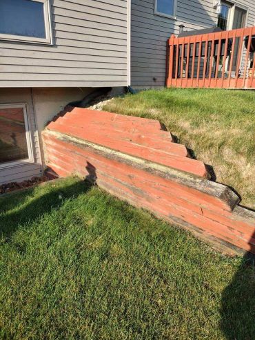 Timber wall ready to be dismantled by Frain Landscaping