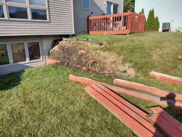 Wall in progress to be rebuild by Frain Landscaping.