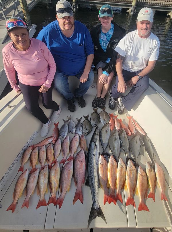 8 hour bottom fishing charter, catch of lane snapper, almaco jacks, vermillion, porgy and barracuda