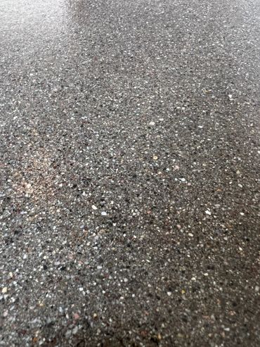 Close-up of a textured concrete surface.