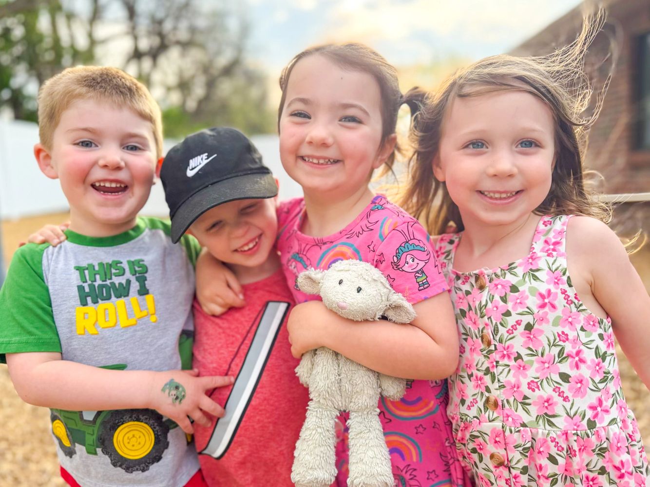 Tiny Tots sharing the joy of friendship outdoors at our Hilliard, OH Preschool and Childcare Center