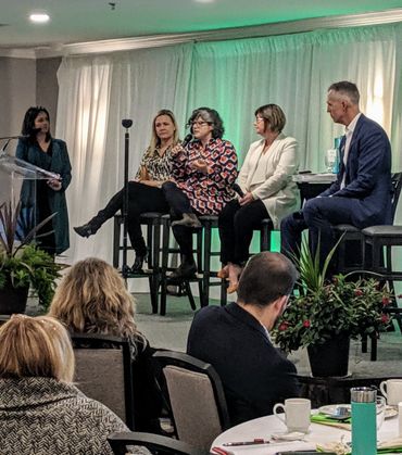 Co-founder Candice Tulsieram hosting a panel on changing mindset