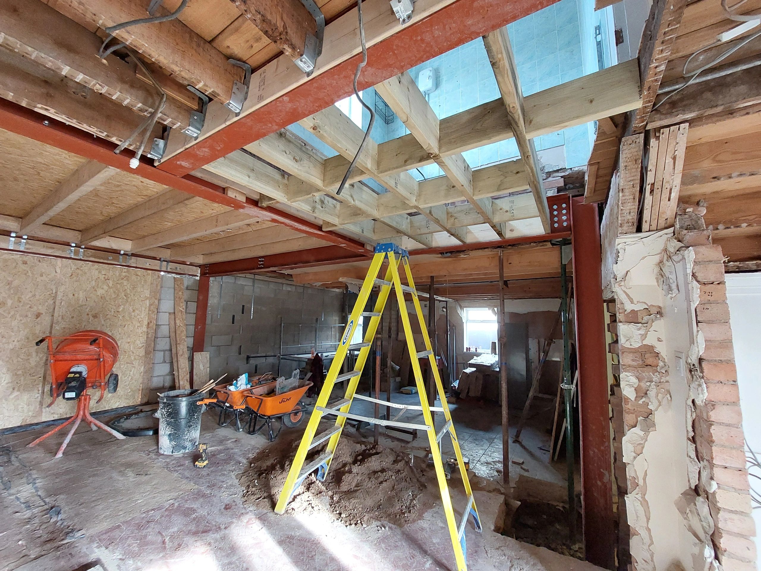 Structural steel frame, column, beams and timber floor joists in residential extension