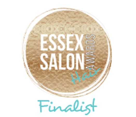 Logo of the Essex Salon Awards with a gold circular design and blue signature.