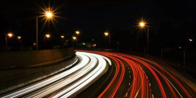 cars driving at night
