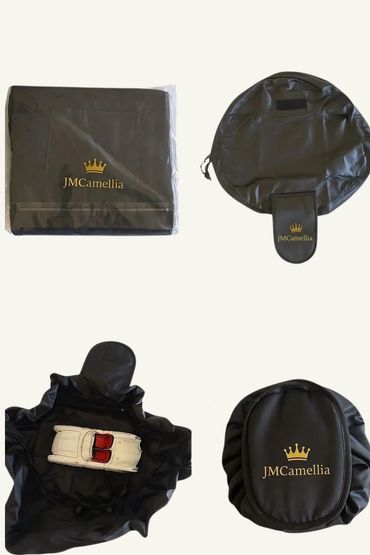 Black JMCamellia branded bag and storage cover for a toy car.
