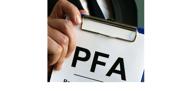 Man in suit holding a clipboard with 'PFA' document.