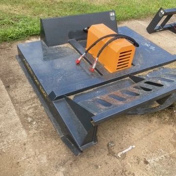 Heavy-duty brush cutter attachment for land clearing and mowing.