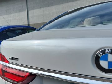 BMW with small dent needing repaired