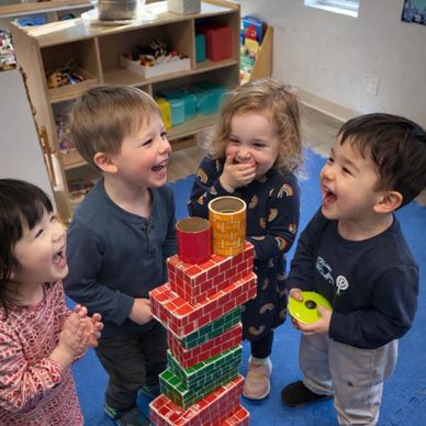 a group a children laughing