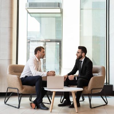 Businessmen discussing deal, sharing startup ideas, business partners negotiations