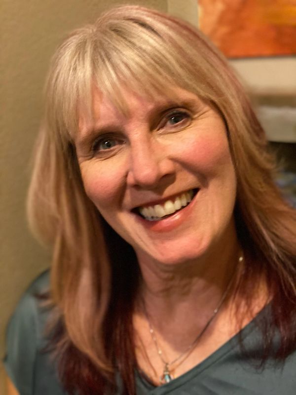 head shot of a woman smiling
