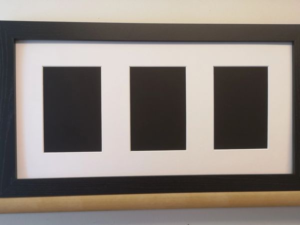 Picture mount with a black frame