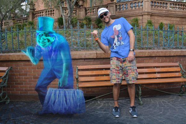 Memory Maker magic outside of the Haunted Mansion inside Magic Kingdom at Walt Disney World.