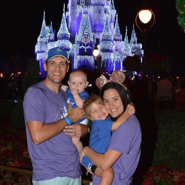 Magic Kingdom at night. Photo outside of the castle all lite up.