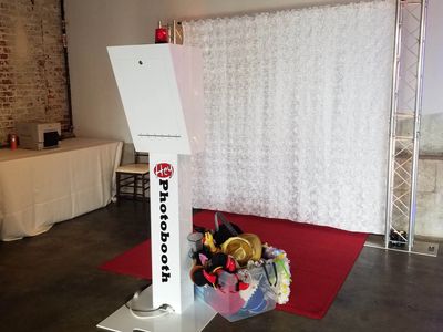 Hey Phoobooth Modern red carpet open air photo booth with props.