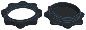 Two black plastic threaded rings.