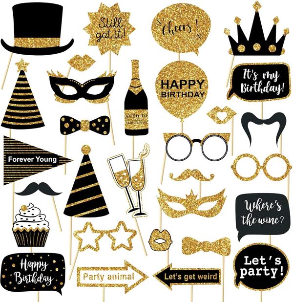 Black and gold birthday party photo booth props with celebratory phrases.