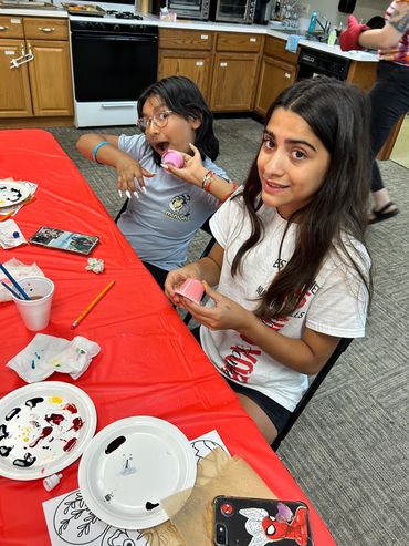 Making butter and food art at Kenna Camp 2023.