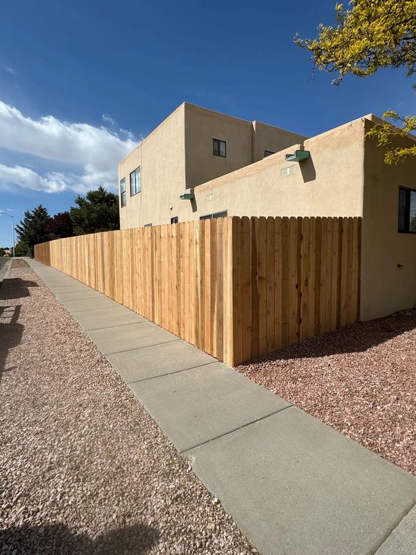 Cedar Privacy Fence Installation in Albuquerque, New Mexico.