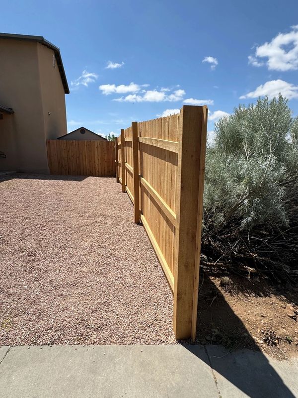 Cedar Privacy Fence Installation in Albuquerque, New Mexico.