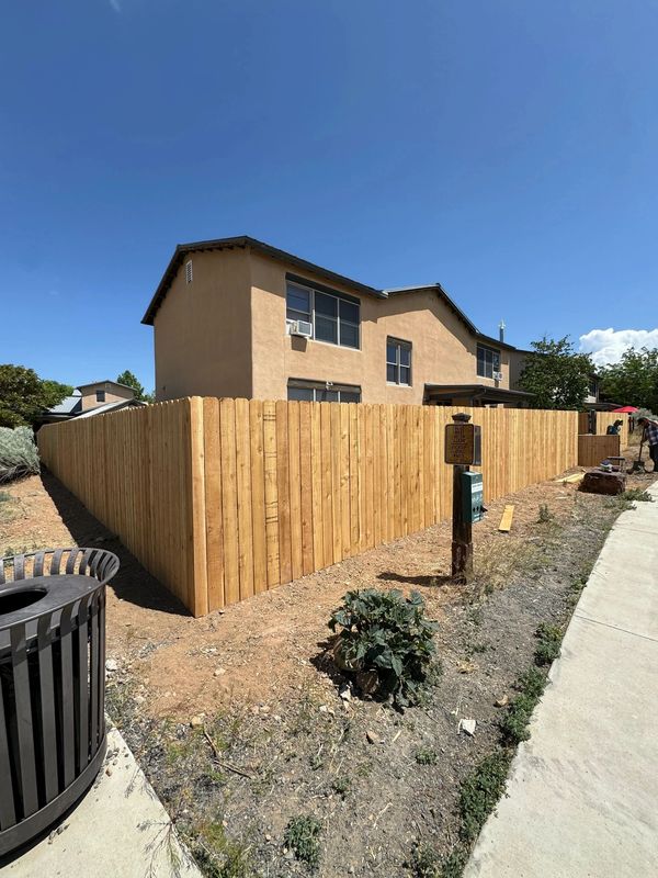 Cedar Privacy Fence Installation in Albuquerque, New Mexico.