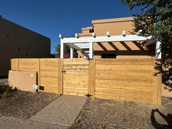 Durable and sleek horizontal fence in Albuquerque, New Mexico by Freddy's Fences.