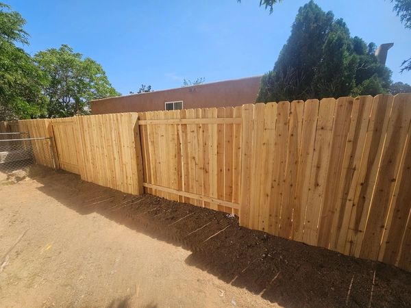 Cedar Privacy Fence Installation in Albuquerque, New Mexico.