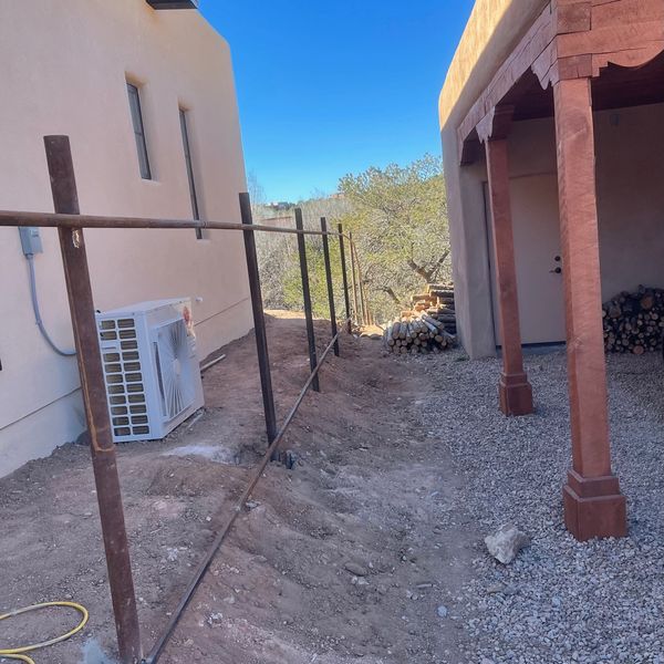 Custom coyote fence by Freddy's Fences in Sandia Park, NM.