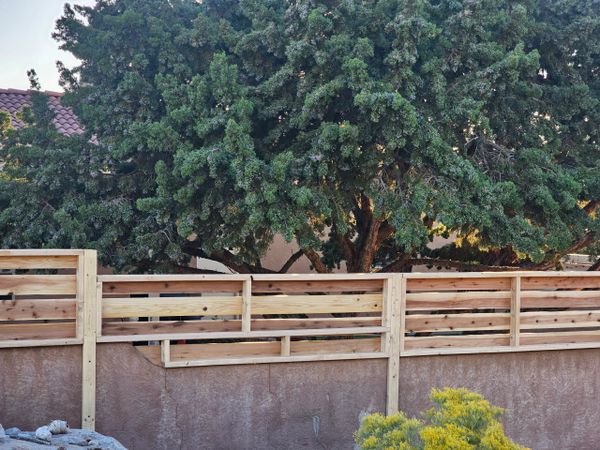 Durable and sleek horizontal fence in Albuquerque, New Mexico by Freddy's Fences