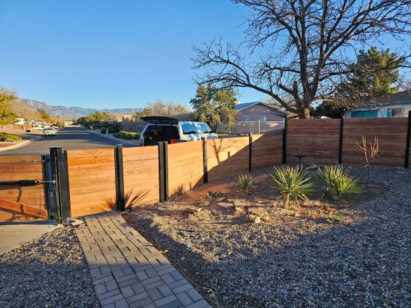 Aluminum post horizontal fence by Freddy's Fences in Albuquerque, NM