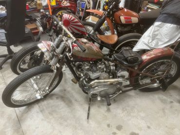 Recent addition to the Triple Deuce Cycles collection.  1968 Triumph bobber hardtail frame with a Ha