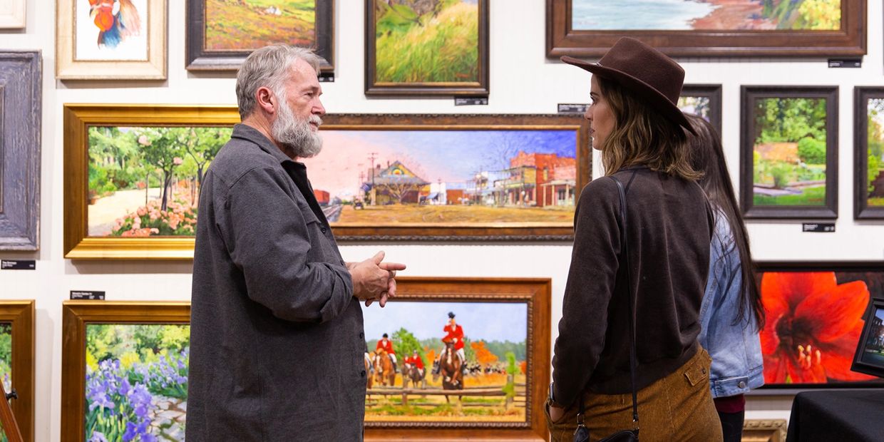 Artist & gallery owner Frank Pierce talks to guests during an Open House. 
Photo ©2019 Kiley Loesch.