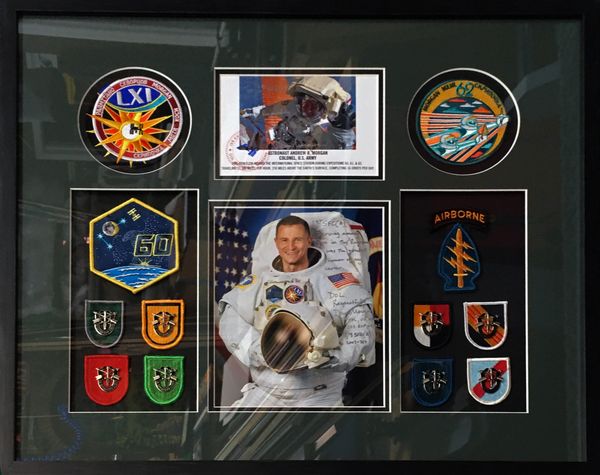 Framing example of a grouping of unit insignia/patches paired with NASA mission patches and photos.