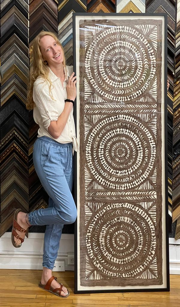 Oversized artwork in a geometric pattern, made of bark