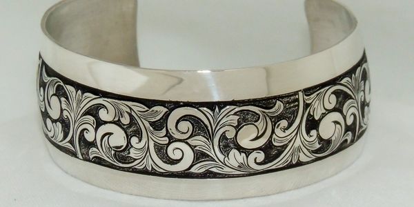 Below are several examples of items Barry Golden has hand-engraved, along with hand-made jewelry.