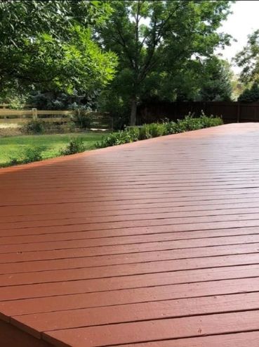 A newly stained pressure treated deck