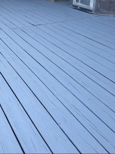 A newly stained pressure treated deck