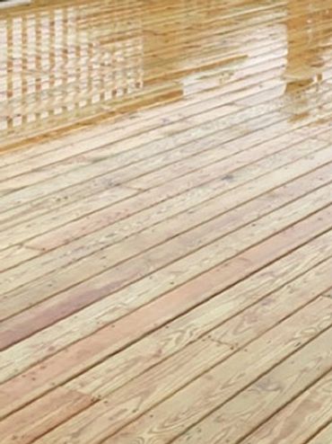A newly stained pressure treated deck