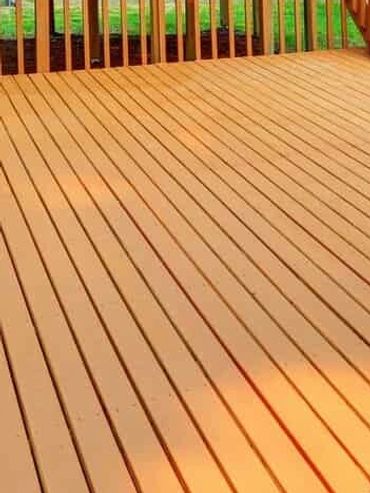 A newly stained pressure treated deck