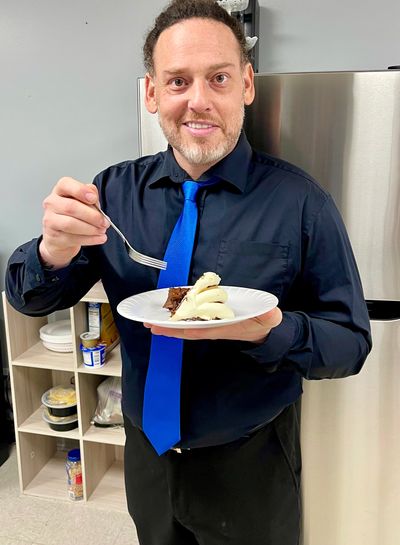 Salvatore Insinga trying the Reese’s Bundt cake from Nothing Bundt cakes.