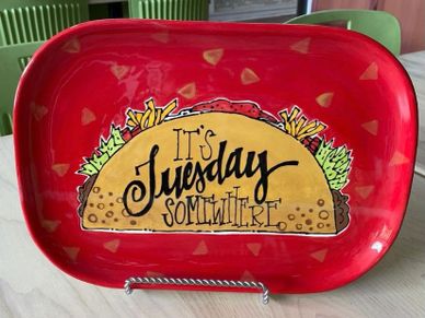 A plate with a taco design