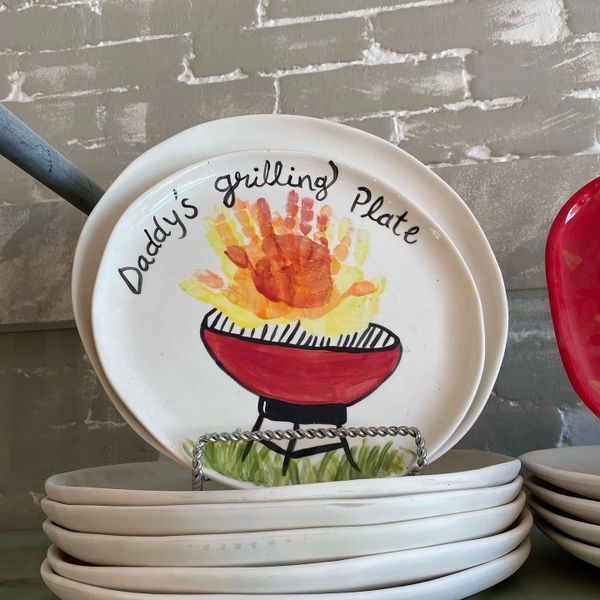 A handpainted design on a ceramic plate