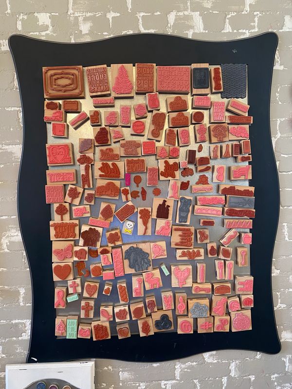 A frame filled with painted clay